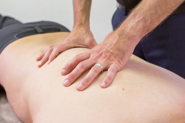 Manual physiotherapy treatment for back pain relief at Core Physio & Pilates.
