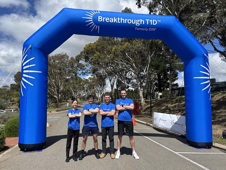 Blue inflatable archway for Parkinson's T1D awareness event at Core Physio & Pilates in Australia.