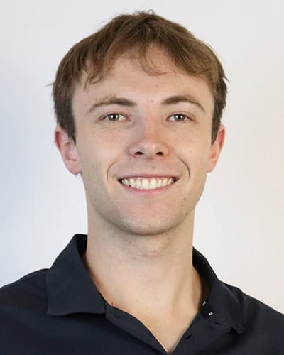 Jett Swaffer smiling, physiotherapy and Pilates expert at Core Physio & Pilates.