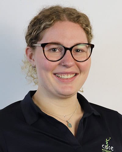Zoe Herde smiling, physiotherapist at Core Physio & Pilates clinic in Australia.