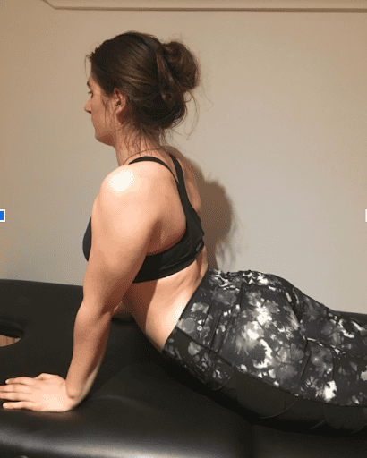 Back stretch exercise for low back pain relief and core strength.